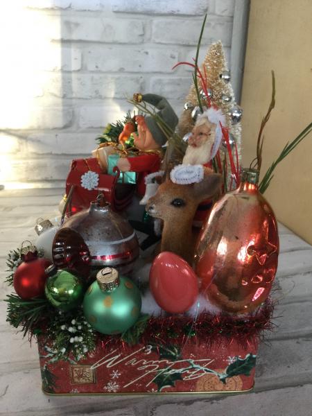 Vintage Christmas tin filled with vintage Christmas decorations picture