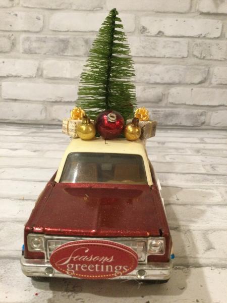 Vintage Ertl wrangler ranch pickup truck filled with antique Christmas decorations picture