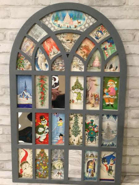 Hanging window with 29 antique cards picture