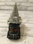 Vintage Hershey truck filled with antique Christmas ornaments and vintage decorations