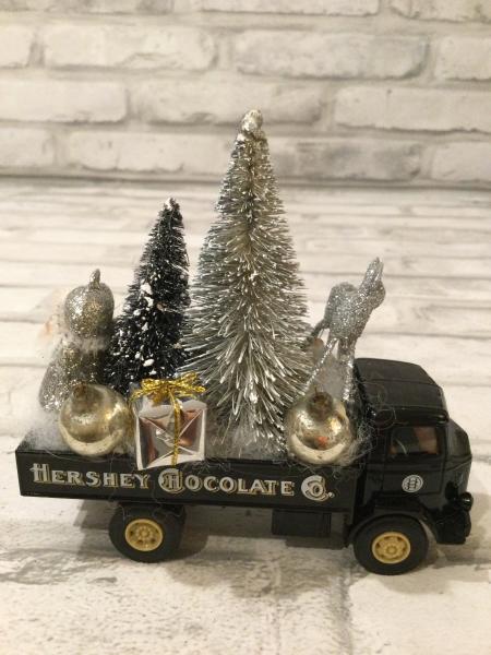 Vintage Hershey truck filled with antique Christmas ornaments and vintage decorations picture