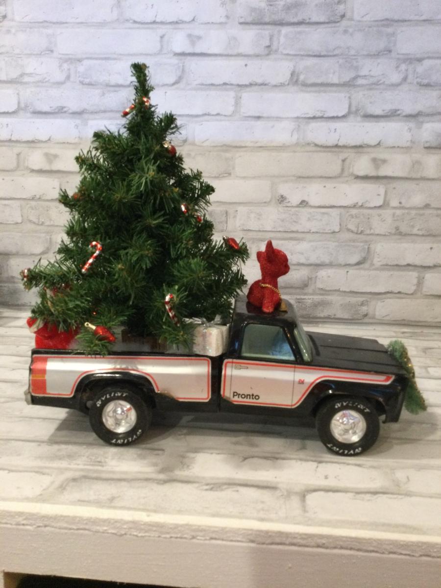 Vintage Pronto truck filled with antique Christmas decorations picture