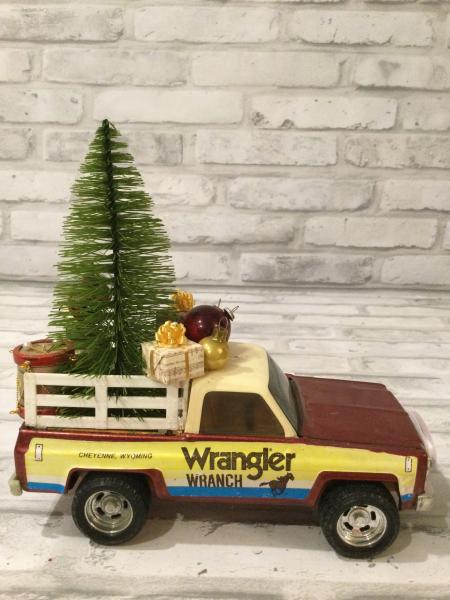 Vintage Ertl wrangler ranch pickup truck filled with antique Christmas decorations picture
