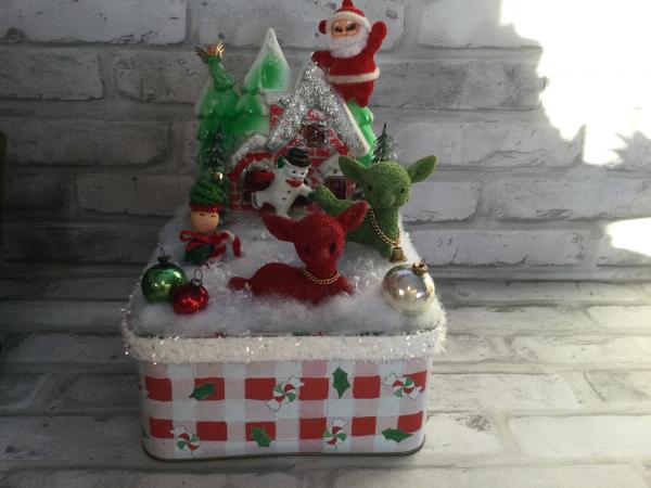 Christmas tin filled with antique Christmas decorations picture