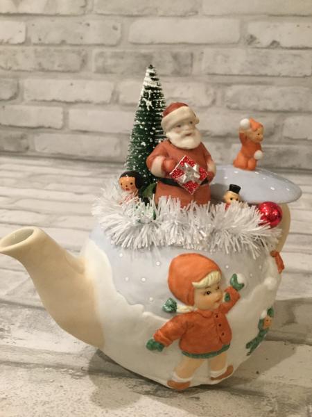 Vintage tea pot with antique ornaments picture