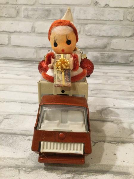 Vintage Tonka truck filled with antique Christmas decorations picture