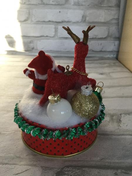 Vintage tin filled with vintage Christmas decorations picture
