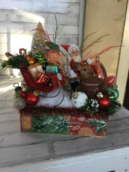 Vintage Christmas tin filled with vintage Christmas decorations