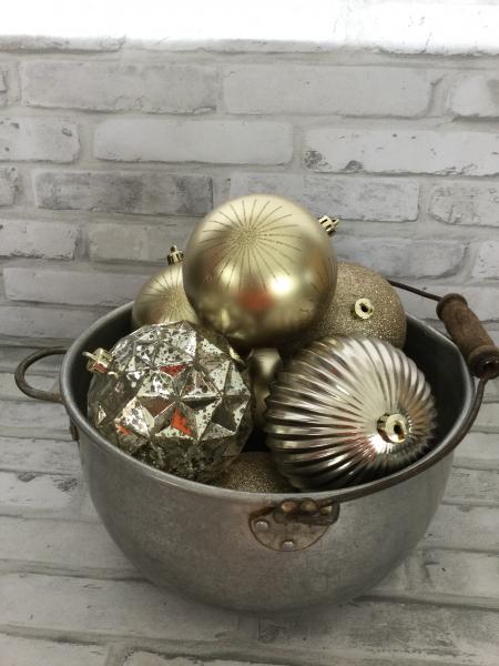 Antique boiling pot filled with ornaments picture