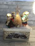 Vintage Christmas tin filled with vintage Christmas decorations and ornaments