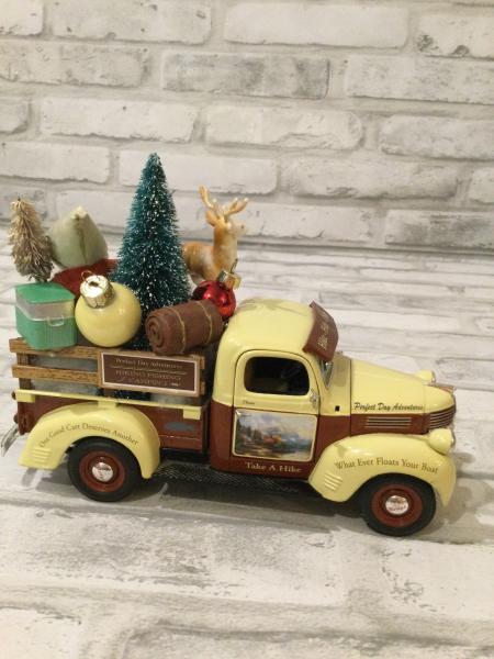 Take a hike truck filled with antique Christmas decorations and ornaments picture