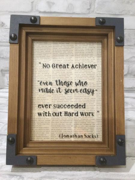 Framed saying no great achiever picture