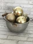 Antique boiling pot filled with ornaments