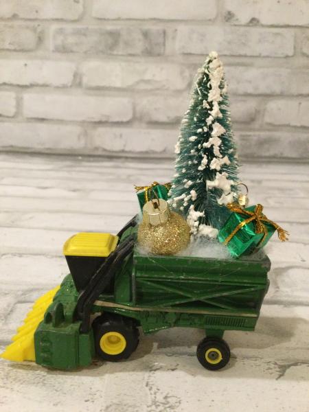 Vintage Johns Deere combine with vintage Christmas decorations