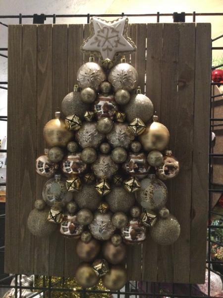 Wood frame with vintage ornaments designed as a tree picture