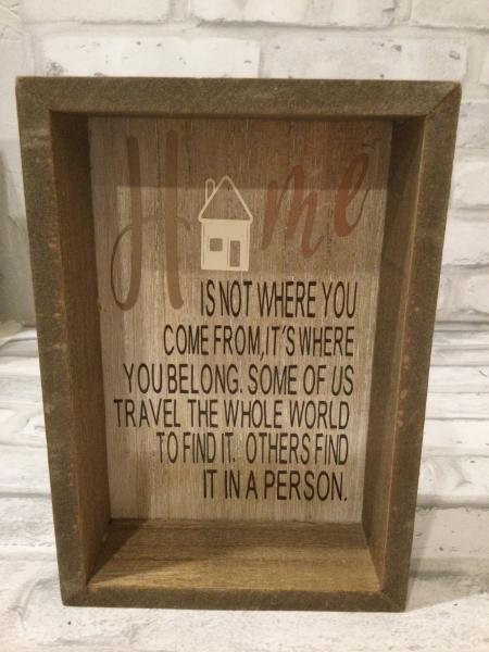 Wood shadow frame with saying.