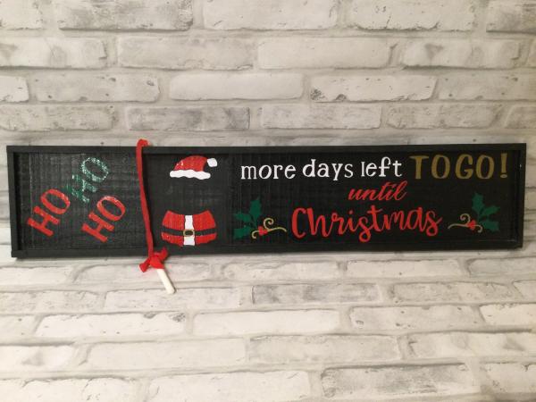 Hanging Christmas sign with count down for each day.