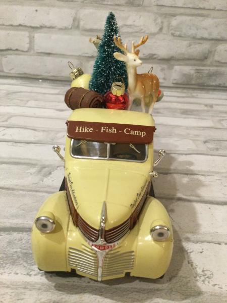 Take a hike truck filled with antique Christmas decorations and ornaments picture