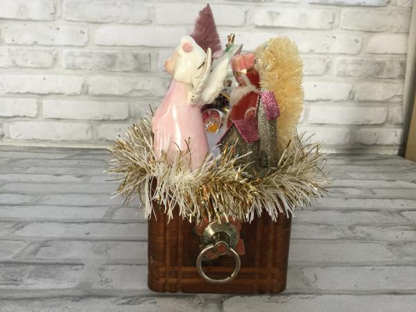 Vintage wooden drawer box filled with antique Christmas decorations picture