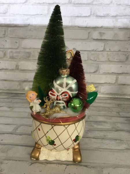 Vintage sleigh filled with antique Christmas and vintage decorations picture