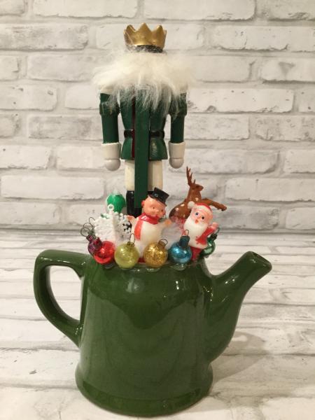 Green ceramic tea pot with antique glass ornaments, etc. picture