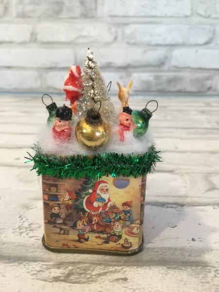 Vintage Christmas tin filled with vintage decorations picture