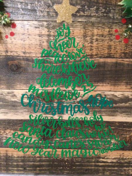 Wood homemade sign. Designed as a Christmas tree picture