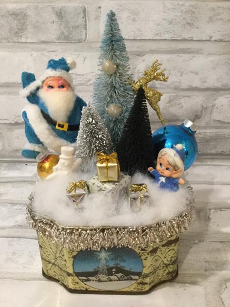 Vintage Christmas tin with blue and gold picture