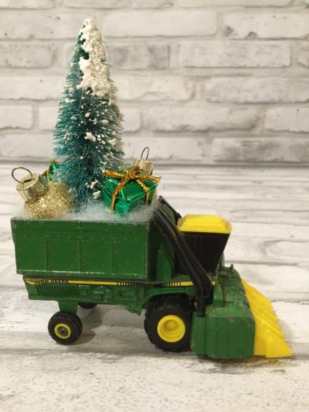 Vintage Johns Deere combine with vintage Christmas decorations picture