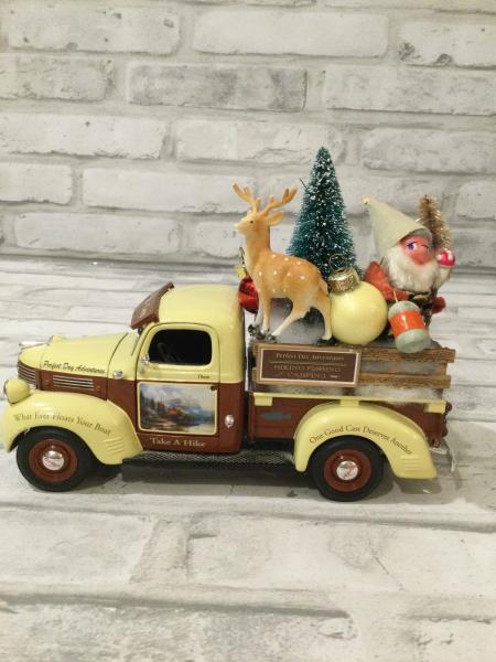 Take a hike truck filled with antique Christmas decorations and ornaments picture