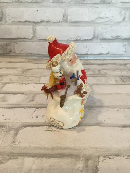 Antique with Santa and decorated gift bag picture