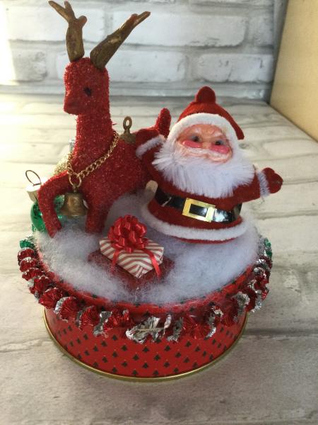 Vintage tin filled with vintage Christmas decorations picture