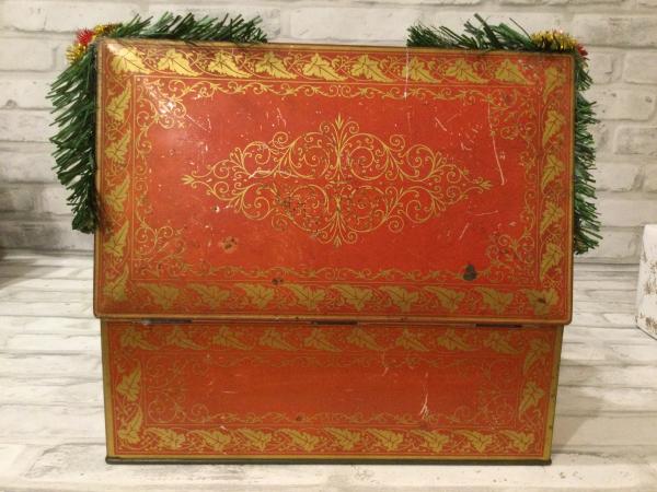 Antique Christmas tin filled with antique Christmas decorations picture