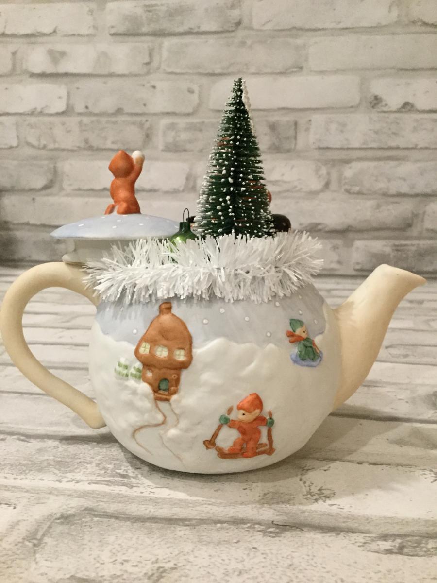 Vintage tea pot with antique ornaments picture