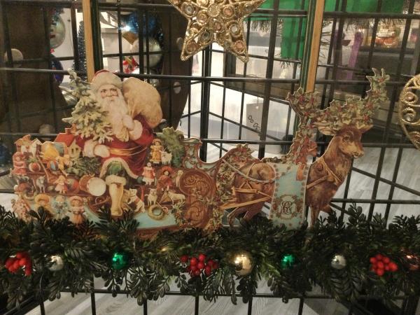Antique window with antique giant Christmas card picture