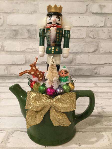 Green ceramic tea pot with antique glass ornaments, etc.