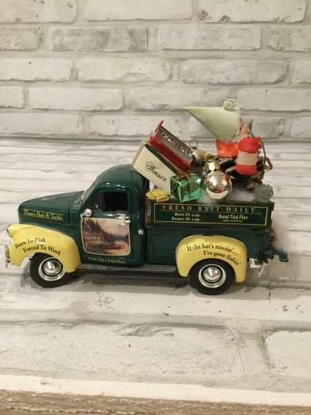 Fishing truck filled with vintage and antique decorations picture