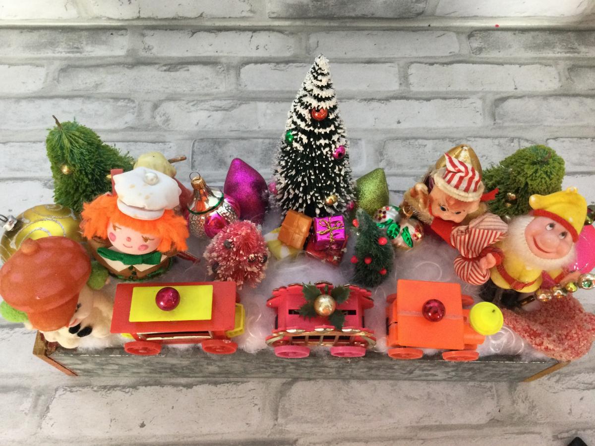 Antique tool box drawer filled with antique Christmas decorations. picture