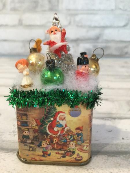 Vintage Christmas tin filled with vintage decorations picture