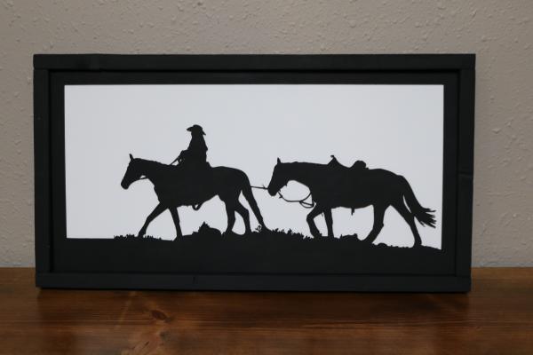 Cowboy on horse-leading horse (#98)