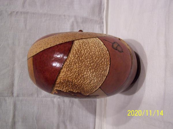 Gourd with wood burning and carving picture