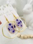 White and purple resin earrings