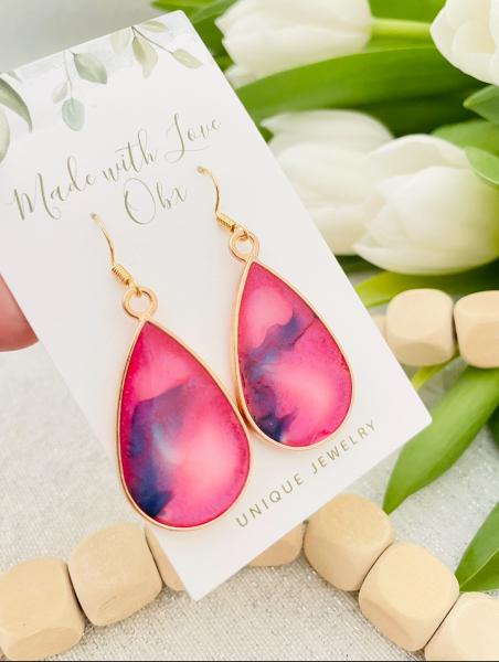 Pink/blue resin earrings picture