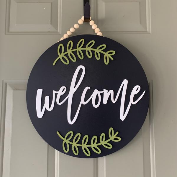 Welcome round Door sign With green laurel picture