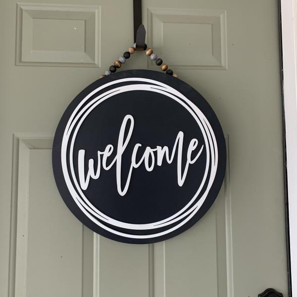 Welcome round Door sign With scribble circle picture