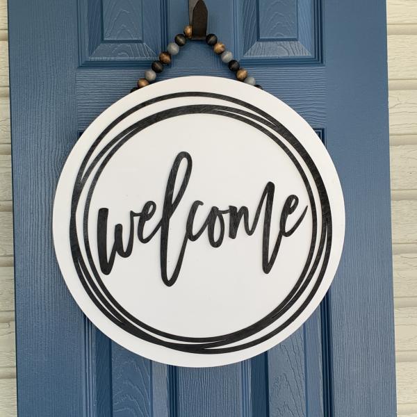 Welcome round Door sign With scribble circle picture