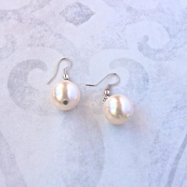 Seashell pearl earring with sterling silver hook picture