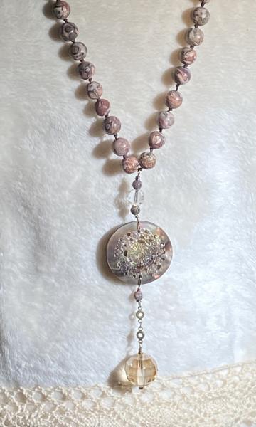 Long hand knotted necklace with leopard skin jasper