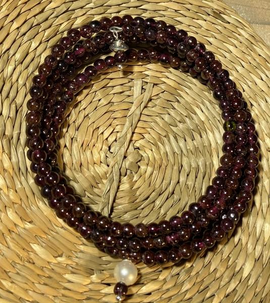 Quadruple coils of garnet beads bracelet