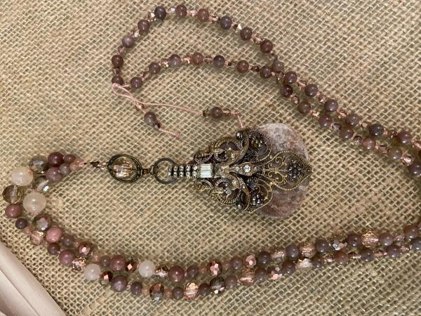 Long hand knotted necklace rose colored beads and vintage clip necklace